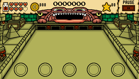 Desert temple stage with a khaki lane, green stone borders and a toothy monster gate